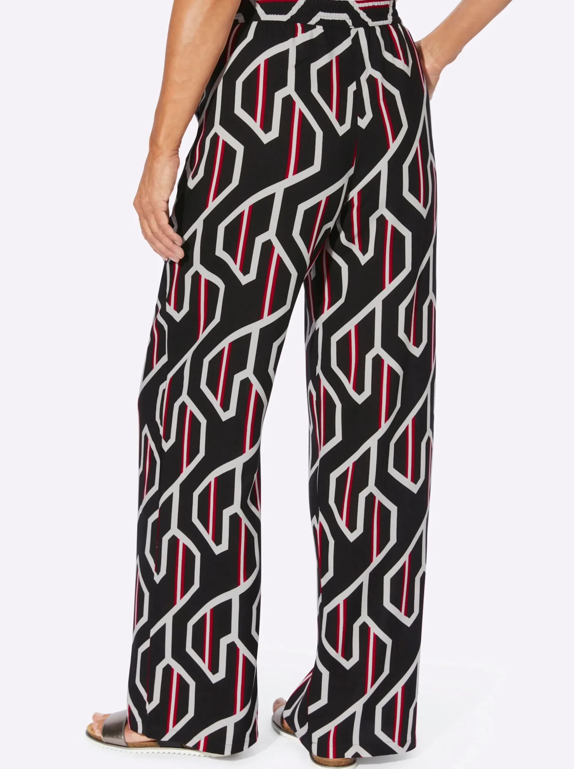Hosen| Druckhose mit vorne glattem Schlupfbund schwarz-rot-bedruckt